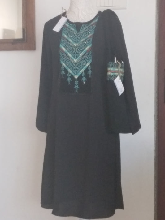 Dress with added embroidery