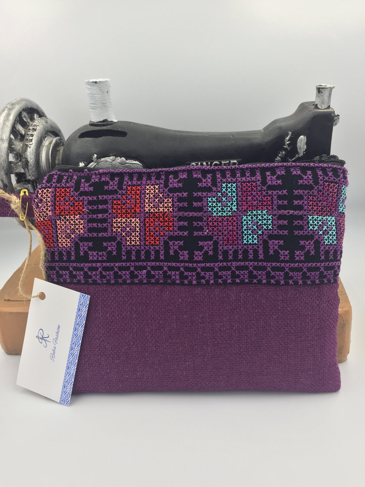 Clutch with embroidery added